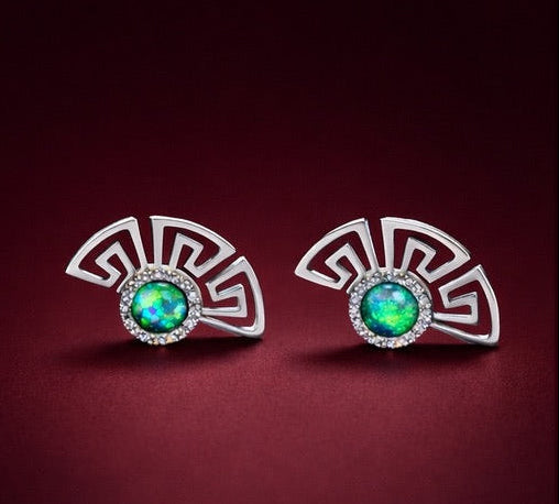 white gold zolotas earrings with diamonds